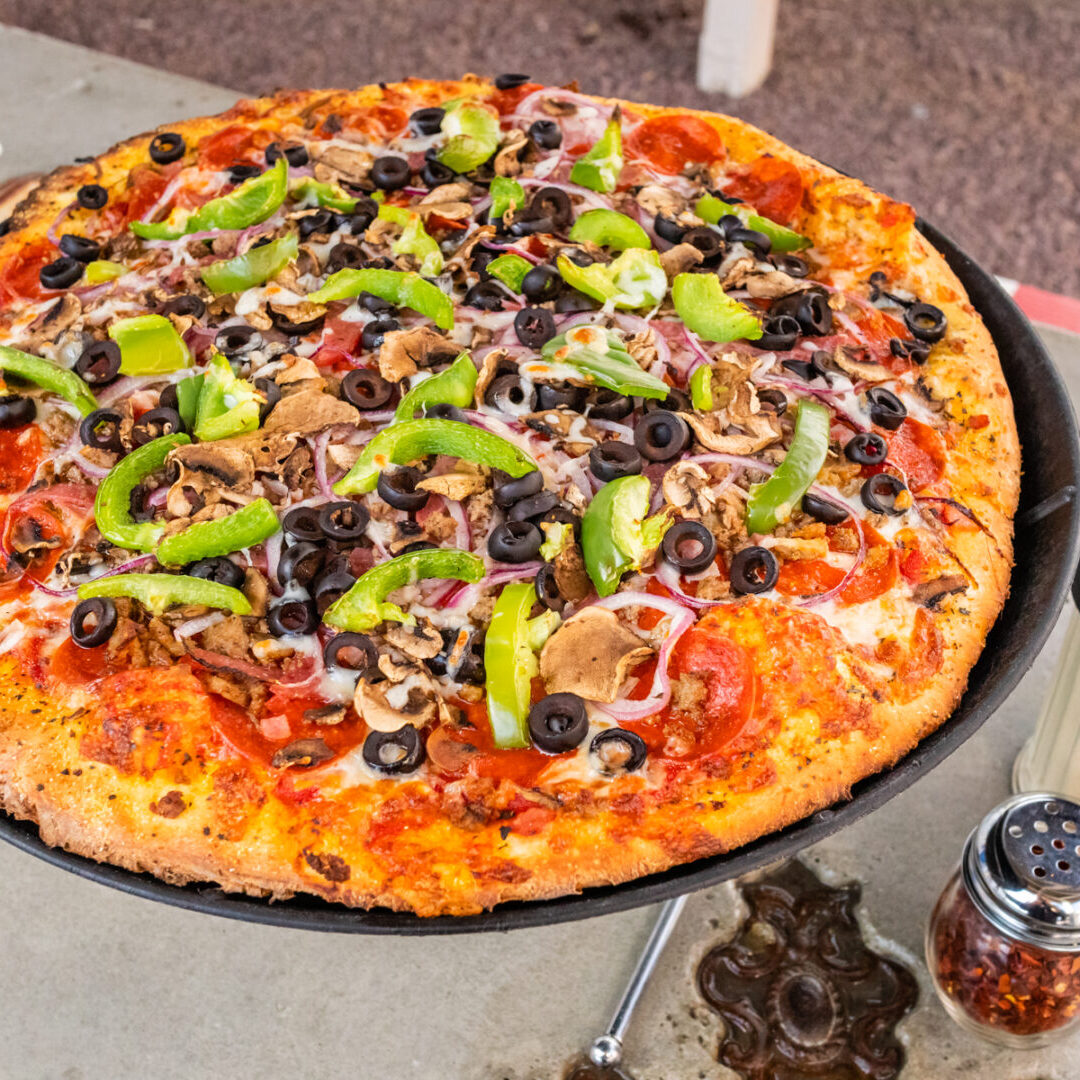 Cover_024_GoDaddy_CrossEyedCowPizza_UnluckyCowPizza